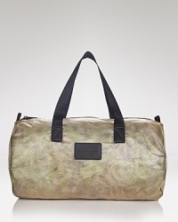 A translucent rubber exterior exposes the intricate, patterned mesh lining and hints at your belongings inside for a fun and functional bag, ideal for your gym routine and packing away your sundries on quick trips out of town. A translucent rubber exterior exposes the intricate, patterned mesh lining and hints at your belongings inside for a fun and functional bag, ideal for your gym routine and packing away your sundries on quick trips out of town.