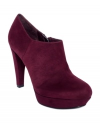 This classic silhouette adds seamless style to your outfit. Marc Fisher's Abetter booties feature a smooth round toe and a completely covered platform and heel. This classic silhouette adds seamless style to your outfit. Marc Fisher's Abetter booties feature a smooth round toe and a completely covered platform and heel.