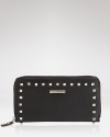 Effortlessly practical with an edge. Rebecca Minkoff crafts another it-girl must-have, this time in studded leather with ample essential-organizing pockets.