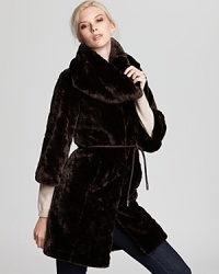Bring sumptuous style to your winter wardrobe with this plush faux fur Laundry by Shelli Segal jacket with infinity matching scarf and arm warmers. Bring sumptuous style to your winter wardrobe with this plush faux fur Laundry by Shelli Segal jacket with infinity matching scarf and arm warmers.