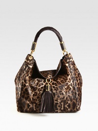 A chic haircalf style in an exotic animal print accented with an oversized tassel detail.Shoulder strap, 10 dropMagnetic snap flap closureOne outside zip pocketOne inside zip pocketTwo inside open pocketsSatin lining11½W X 12½H X 3½DImported A chic haircalf style in an exotic animal print accented with an oversized tassel detail.Shoulder strap, 10 dropMagnetic snap flap closureOne outside zip pocketOne inside zip pocketTwo inside open pocketsSatin lining11½W X 12½H X 3½DImported