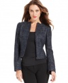 T Tahari puts a modern twist on tweed with this cropped, collarless jacket, adorned with flecks of metallic in the weave.