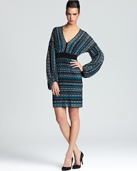 With a subtle retro look, Laundry by Shelli Segal's cozy knit sweater dress shows off chic comfort. With a subtle retro look, Laundry by Shelli Segal's cozy knit sweater dress shows off chic comfort.
