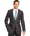 Upgrade your work-week statement with a subtle checkered pattern on this handsome Kenneth Cole Reaction jacket.