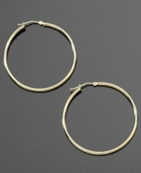 These delicate hoop earrings are the perfect compliment to your dressed-up style or everyday look. Crafted in 14k gold. Approximate diameter: 3/8 inch. These delicate hoop earrings are the perfect compliment to your dressed-up style or everyday look. Crafted in 14k gold. Approximate diameter: 3/8 inch.