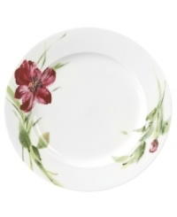 Painterly lilies bloom around this porcelain dinner plate, creating a beautiful arrangement with the rest of Oleg Cassini's Sweet Blossom dinnerware. Painterly lilies bloom around this porcelain dinner plate, creating a beautiful arrangement with the rest of Oleg Cassini's Sweet Blossom dinnerware.