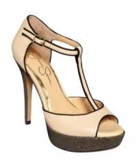 Thinly-lined t-straps are ultra-feminine, and elegant contrast throughout makes Jessica Simpson's Bansi platform sandals so very pretty. Thinly-lined t-straps are ultra-feminine, and elegant contrast throughout makes Jessica Simpson's Bansi platform sandals so very pretty.