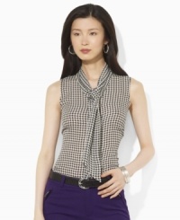A bold houndstooth pattern sweeps across Lauren by Ralph Lauren's silk georgette blouse, accented with scarf ties at the neckline for a glamorous finish (Clearance) A bold houndstooth pattern sweeps across Lauren by Ralph Lauren's silk georgette blouse, accented with scarf ties at the neckline for a glamorous finish (Clearance)