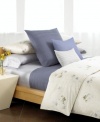 Cool and calm in a serene blue shade, this decorative pillow from Calvin Klein accents your Rhone bed with understated elegance. Featuring pure cotton.