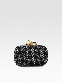 A high-contrast, tweed style in warm wool with radiant hardware.Detachable chain shoulder strap, 20¾ dropTop clasp closureOne inside open pocketFully lined5¼W X 3½H X 1½DImported A high-contrast, tweed style in warm wool with radiant hardware.Detachable chain shoulder strap, 20¾ dropTop clasp closureOne inside open pocketFully lined5¼W X 3½H X 1½DImported