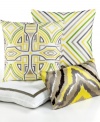 Featuring a white background with grey, beige, green & yellow embroidery, this Trina Turk decorative pillow adds a burst of color and modern sophistication to your bed.