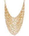 A real conversation starter. Haskell's stunning bib necklace combines layers of golden mesh and sparkling crystal accents. Crafted in gold tone mixed metal. Approximate length: 17 inches + 3-inch extender. Approximate drop: 6-3/4 inches.