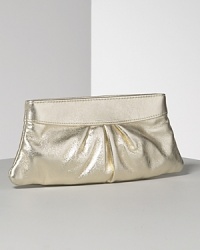 The Lauren Merkin Eve textured lambskin leather clutch is undeniably modern and chic. Pleated detail for textural interest. Opens to a hexagonal frame and secures with a hinge closure. Signature pink striped shimmer lining. The Lauren Merkin Eve textured lambskin leather clutch is undeniably modern and chic. Pleated detail for textural interest. Opens to a hexagonal frame and secures with a hinge closure. Signature pink striped shimmer lining.