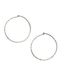 Trendy, chic, and timeless! The perfect accessory for any ensemble - these medium-sized hammered hoops by Lucky Brand feature a silver tone mixed metal setting. Approximate diameter: 2 inches. Trendy, chic, and timeless! The perfect accessory for any ensemble - these medium-sized hammered hoops by Lucky Brand feature a silver tone mixed metal setting. Approximate diameter: 2 inches.