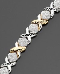 X's and O's of 14k gold over sterling silver and sterling silver create a romantic mood on this fine bracelet. Approximate length: 7-1/2 inches. X's and O's of 14k gold over sterling silver and sterling silver create a romantic mood on this fine bracelet. Approximate length: 7-1/2 inches.