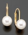 An elegant classic. These beautiful earrings feature cultured freshwater pearls (6.5-7 mm) set in 14k gold. Approximate drop: 3/4 inch.
