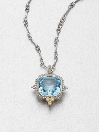 From the Estate Collection. Beautifully faceted blue topaz stone set in intricately designed, sterling silver accented with 18k gold and white sapphires on a twisted link chain. Blue topazSterling silver18k goldWhite sapphiresLength, about 17Pendant size, about 1Lobster clasp closureImported