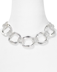 This chain link necklace from Robert Lee Morris Soho features the craftsmanship the designer is known for, accented with sparkling pave crystal details. This chain link necklace from Robert Lee Morris Soho features the craftsmanship the designer is known for, accented with sparkling pave crystal details.