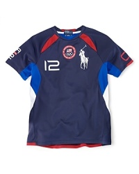This soft microfiber crewneck tee celebrates Team USA's participation in the 2012 Olympics with bold graphics on the front, arms and back. This soft microfiber crewneck tee celebrates Team USA's participation in the 2012 Olympics with bold graphics on the front, arms and back.