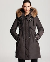 This Moncler coat is ready for sipping hot chocolate at the ski lodge. Soft fur trim adds a luxe touch, while a drawstring at the waist ties under the bust for a flattering finish. This Moncler coat is ready for sipping hot chocolate at the ski lodge. Soft fur trim adds a luxe touch, while a drawstring at the waist ties under the bust for a flattering finish.