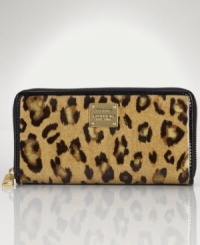 On the prowl for the purr-fect gift? This posh leopard-print wallet from Lauren Ralph Lauren is a purse pleaser. Luxe patent leather is elegantly adorned with signature hardware, while the organized interior stows currency with care. Presented in a signature gift box.