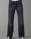 Soft Italian cotton denim in a dark blue denim with subtle fading and whiskering detail. Fading has a slight brown cast Straight-leg, relaxed fit Button fly Five-pocket style Slight distressing on pockets Signature squiggle stitching on back pockets Inseam, about 33¼ Machine wash Made in USA