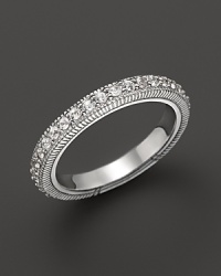Sparkling sapphires decorative a sterling silver band ring from Judith Ripka. Sparkling sapphires decorative a sterling silver band ring from Judith Ripka.