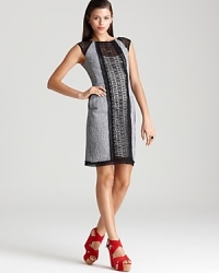 A cool mix of fabrication and pattern brings striking textural interest to this Nanette Lepore dress. A cool mix of fabrication and pattern brings striking textural interest to this Nanette Lepore dress.