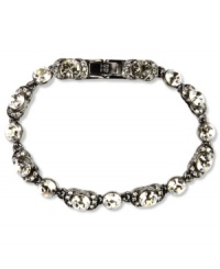 Sparkle with a little mood lighting. Swarovski crystals shine on Givenchy's flex bracelet. Crafted in hematite tone mixed metal. Approximate length: 7-1/4 inches. Sparkle with a little mood lighting. Swarovski crystals shine on Givenchy's flex bracelet. Crafted in hematite tone mixed metal. Approximate length: 7-1/4 inches.