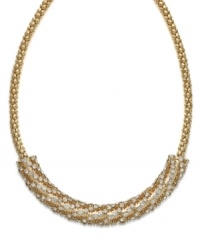 Glam it up! With a touch of crystal and a gold tone mixed metal setting, Alfani's frontal necklace is well-equipped for any special occasion. Approximate length: 18 inches + 2-inch extender.