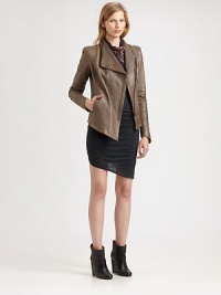 Embrace the urban-cool trend with this supple leather jacket, renewed by an oversized collar and asymmetrical hem. Oversized asymmetrical collarLong sleevesFront snap closures; zipperSlash pocketsAsymmetrical hemAbout 23 from shoulder to hem at longest pointLeatherDry clean with leather specialistImported of Italian fabricModel shown is 5'10 (177cm) wearing US size Small. Embrace the urban-cool trend with this supple leather jacket, renewed by an oversized collar and asymmetrical hem. Oversized asymmetrical collarLong sleevesFront snap closures; zipperSlash pocketsAsymmetrical hemAbout 23 from shoulder to hem at longest pointLeatherDry clean with leather specialistImported of Italian fabricModel shown is 5'10 (177cm) wearing US size Small.