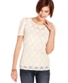 Style&co. gives this sweet lace petite top a dash of daring with slightly puffed sleeves. Try this sheer style with a cami and pencil skirt for a stylish work ensemble or wear on the weekend to dress up denim.