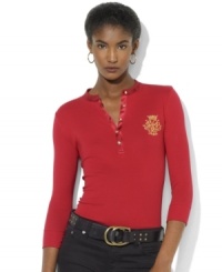 A Henley silhouette rendered in soft cotton features charmeuse trim at the neckline and a beaded embroidered LRL crest for glamorous updates to Lauren Ralph Lauren's classic petite style. A Henley silhouette rendered in soft cotton features charmeuse trim at the neckline and a beaded embroidered LRL crest for glamorous updates to Lauren Ralph Lauren's classic petite style.