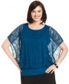 Look amazing in lace with Alfani's butterfly sleeve plus size top, finished by a banded hem.