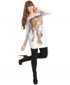 Look purr-fect this season with ING's long sleeve plus size tunic top, spotlighting a leopard print!