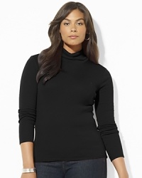 A classic long-sleeved turtleneck is crafted in soft cotton for easy style and comfort. A classic long-sleeved turtleneck is crafted in soft cotton for easy style and comfort.