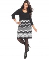 Conquer the cold in style with Spense's plus size sweater dress.