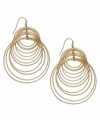 Spiral style. INC International Concepts comes full circle with this pair of hook earrings. Crafted from gold-tone mixed metal, the earrings offer a post-modern fashion touch. Approximate drop: 2-1/2 inches.