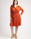 Wrap yourself in style this season with this chic, jersey dress. Featuring a universally flattering silhouette and waist-defining belt, there is so much to love about this design.V-necklineLong sleevesWrap-front designSelf-tie beltAbout 38 from shoulder to hem92% modal/8% spandexDry cleanMade in USA