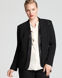 Start with a clean slate in this sleek Jones New York Collection Plus tuxedo jacket touting layered satin lapels for a touch of modernity. Start with a clean slate in this sleek Jones New York Collection Plus tuxedo jacket touting layered satin lapels for a touch of modernity.