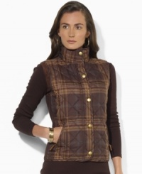 Lauren Ralph Lauren's classic quilted petite vest is finished in a bold plaid pattern, adding an extra heritage element to the ensemble. Lauren Ralph Lauren's classic quilted petite vest is finished in a bold plaid pattern, adding an extra heritage element to the ensemble.