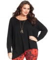 Top off your casual looks with DKNY's plus size sweater, punctuated by an asymmetrical hem.
