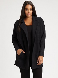 Whether worn over a sleek or relaxed-fit top, this boiled merino wool coat is sure to make a stylish first impression. Notched collarDolman sleevesWelt pocketsAbout 32 from shoulder to hemBody: merino woolSleeves: merino wool/nylon/spandexDry cleanImported Whether worn over a sleek or relaxed-fit top, this boiled merino wool coat is sure to make a stylish first impression. Notched collarDolman sleevesWelt pocketsAbout 32 from shoulder to hemBody: merino woolSleeves: merino wool/nylon/spandexDry cleanImported