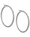Pave your way to pure fashion. These Jones New York hoop earrings sparkle with crystal glass accents. Crafted in worn silver tone mixed metal. Approximate diameter: 1-3/4 inches.