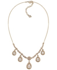 Lovely and luminous. Carolee's five teardrop frontal necklace features sparkling glass accents in 12k gold-plated mixed metal. Approximate length: 16 inches + 2-inch extender. Approximate drop: 1-1/4 inches. Lovely and luminous. Carolee's five teardrop frontal necklace features sparkling glass accents in 12k gold-plated mixed metal. Approximate length: 16 inches + 2-inch extender. Approximate drop: 1-1/4 inches.