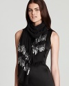 Dress up looks-from the office to cocktails-with this lightweight, sequin-embellished wrap from Collection 59.