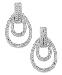 A welcome addition. This pair of door knocker-styled earrings from Eliot Danori is crafted from rhodium-plated brass with crystal accents adding luster. Approximate drop: 1 inch. A welcome addition. This pair of door knocker-styled earrings from Eliot Danori is crafted from rhodium-plated brass with crystal accents adding luster. Approximate drop: 1 inch.