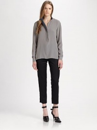 Urban-cool top in a soft silk blend with hidden snap closures, contrast trim and a draped back opening. Hidden snap closuresLong sleevesButtoned cuffsDraped back slit65% acetate/35% silkDry cleanImported of Italian fabricModel shown is 5'10 (177cm) wearing US size 4. Urban-cool top in a soft silk blend with hidden snap closures, contrast trim and a draped back opening. Hidden snap closuresLong sleevesButtoned cuffsDraped back slit65% acetate/35% silkDry cleanImported of Italian fabricModel shown is 5'10 (177cm) wearing US size 4.