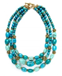 A seasonal necessity. Lauren Ralph Lauren's cheery three-row necklace features reconstituted turquoise beads and openwork metal accents. Ring and toggle closure. Crafted in 14k gold-plated mixed metal. Approximate length: 22 inches.