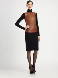 A supple panel of beautifully tanned leather covers the front of this fine-knit cashmere pullover.TurtleneckLong sleevesLeather front panel85% cashmere/14% nylon/1% elastaneDry cleanMade in Italy of imported fabricModel shown is 5'11 (180cm) wearing US size 4. A supple panel of beautifully tanned leather covers the front of this fine-knit cashmere pullover.TurtleneckLong sleevesLeather front panel85% cashmere/14% nylon/1% elastaneDry cleanMade in Italy of imported fabricModel shown is 5'11 (180cm) wearing US size 4.